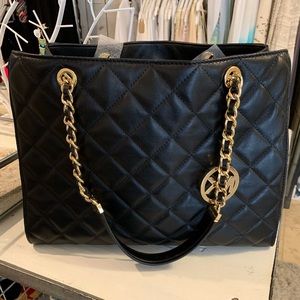 Black Michael Kors quilted leather handbag